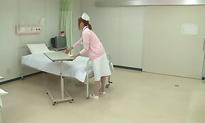 Hawt Japanese Nurse gets banged at hospital bed by a horny patient!