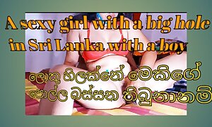 A despondent girl with a big gap close to Sri Lanka with a pal