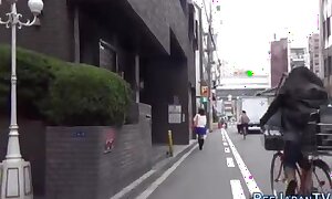 Japanese old bag pissing in public street